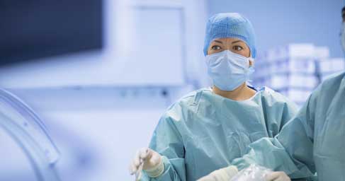 Woman doctor in operating room